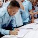 Supian Suri Paslon Wali kota Depok beserta Chandra Rahmanayah saat isi daftar hadir. (dok. Harianesia)